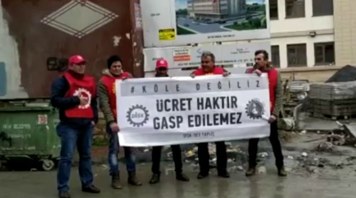 Dev-Yapı İş üyesi işçiler ödenmeyen ücretleri için basın açıklaması yaptı
