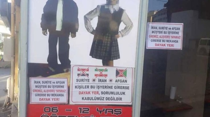 Irkçı afiş asan esnafa 'uyarı' cezası