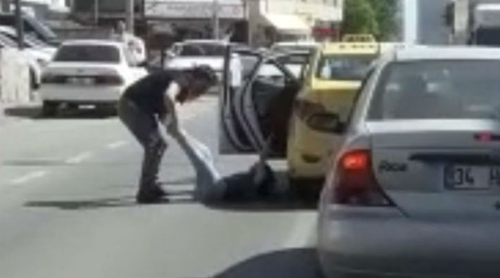Kadını yola fırlatan taksici yakalandı