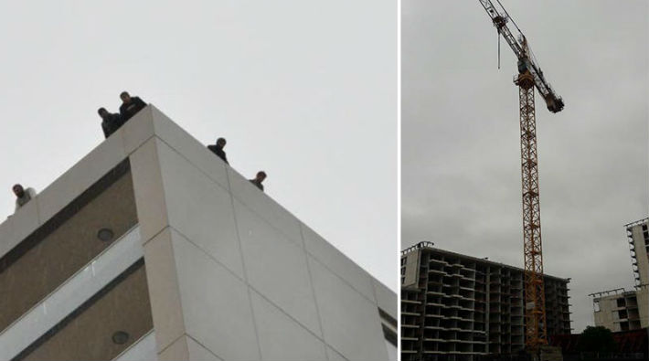 Maaşlarını alamayan inşaat işçileri çatıya ve vincin tepesine çıktı