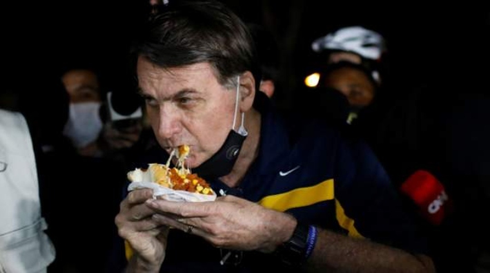 Brezilya halkı Bolsonaro'ya tepki gösterdi: 'Katil! İşini düzgün yap!'
